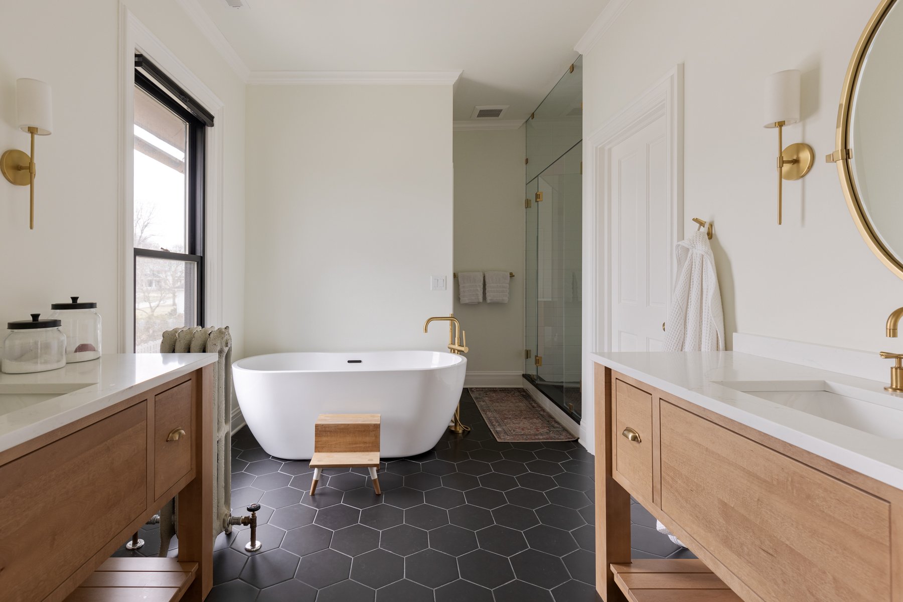 Hexagonal floor tile pattern remodeled by Hogan Design and Construction