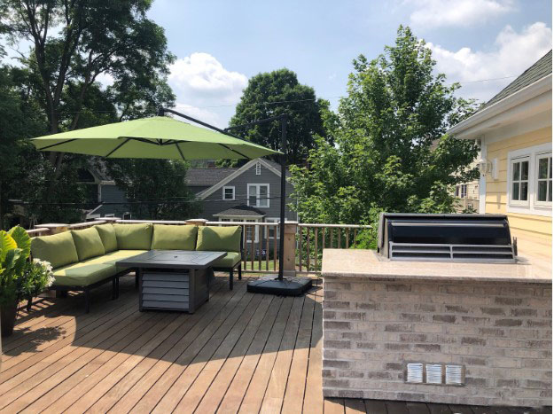roof-top-deck-with-sectional-umbrella-and-built-in-grill