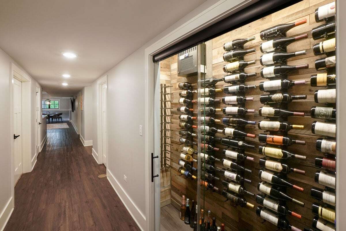 Wine cellar with a chiller fitted onto a basement wall - Universal Luxury 2