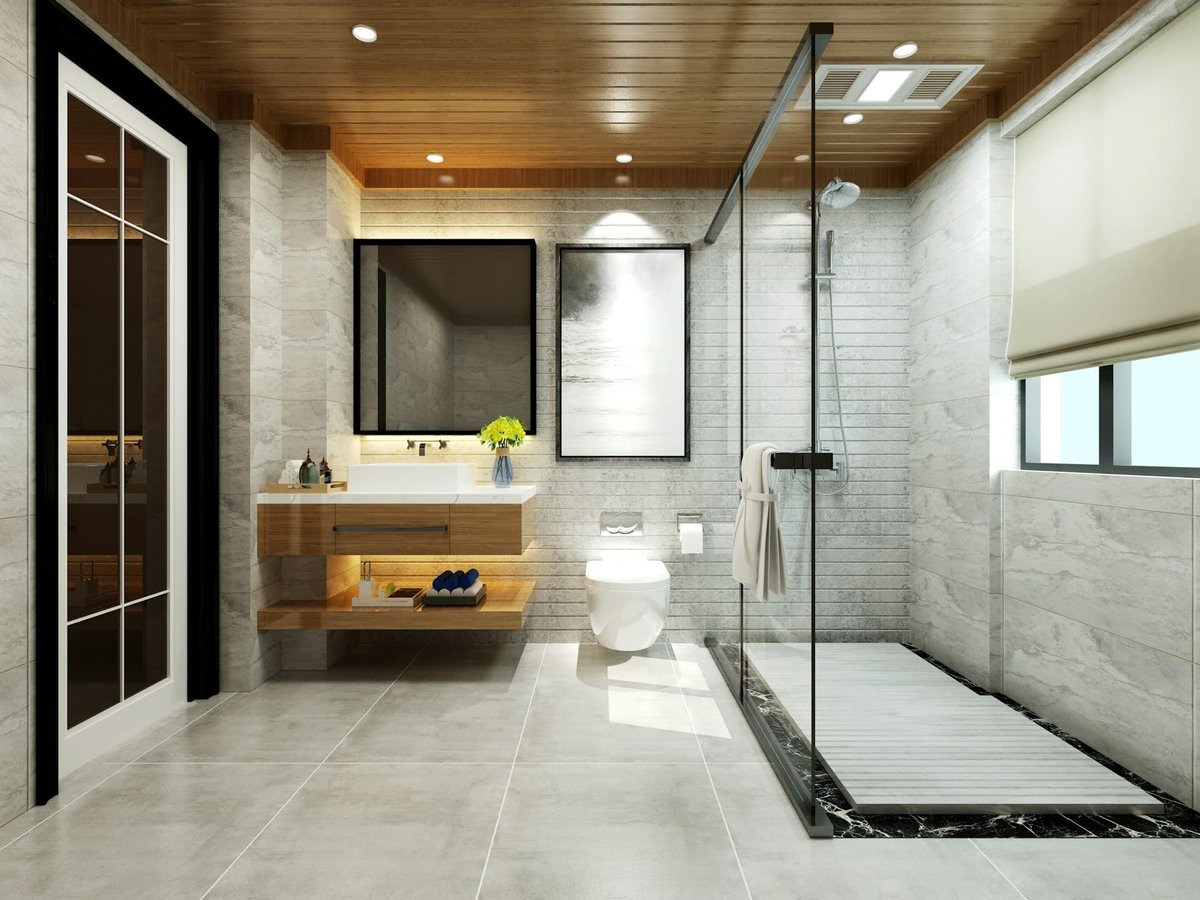 In this doorless walk-in shower, natural light and light tile offer visual interest when contrasted with the wood paneling on the ceiling