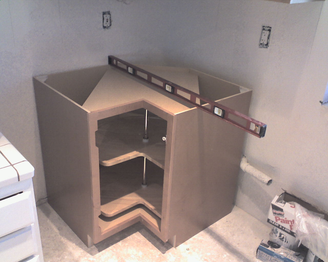 Kitchen cabinet corner design showing turntable inside