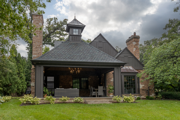 Exterior of home with luxury outdoor entertainment area