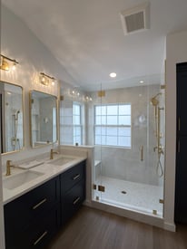 Double vanity master bathroom with a walk in shower