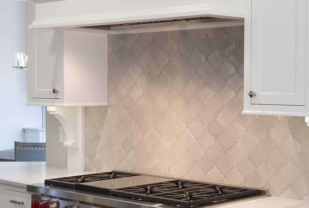 Matthewson Kitchen with geometric tile patterns backsplash remodeled by Hogan Design