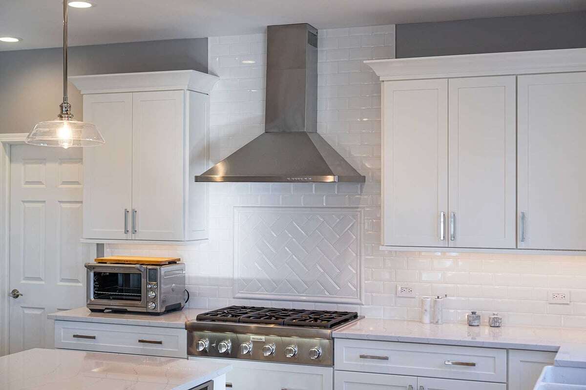 North Elm kitchen remodel with high gloss white grid tile patterns
