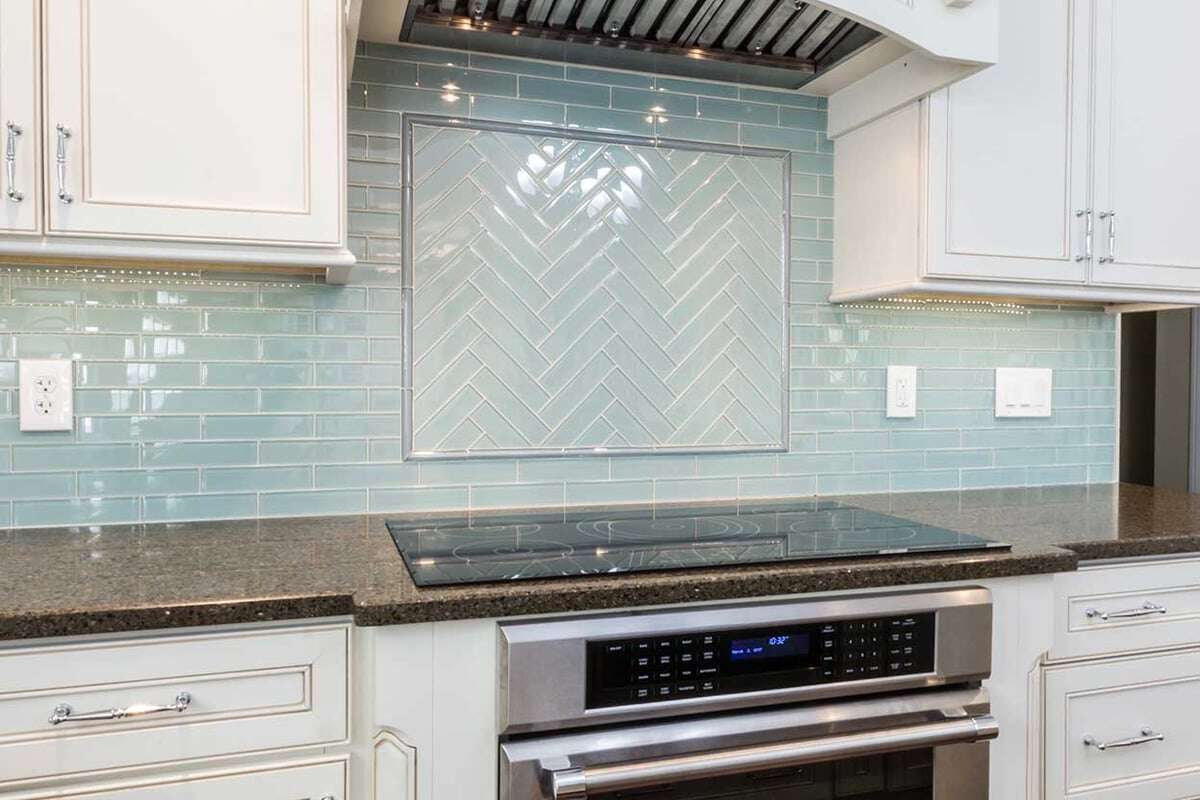 Two distinct tile patterns in Preston Kitchen remodeled by Hogan Design and Construction