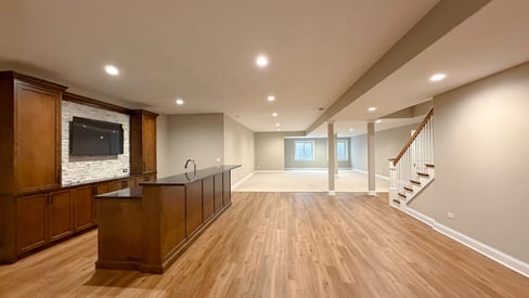 A luxurious full bar/kitchen in the basement of a new home build