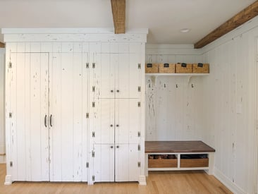 Mudroom cabinetry and coat hooks for lots of additional storage space