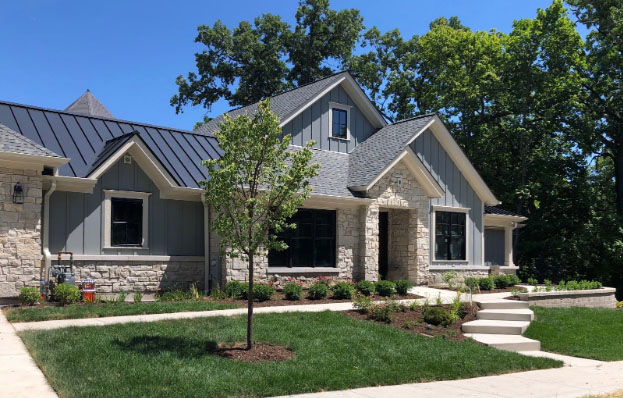 Exterior-of-home-with-stone-and-cedar-siding