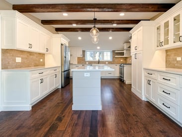 Wide angle of a contemporary kitchen remodel with lots of natural light to fill the space