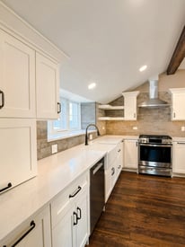 Kitchen countertop and prep station next to a sink